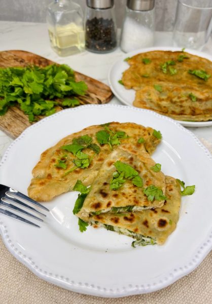Tasty Qutab Snack with Herbs and Cheese